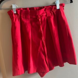 Babaton red flowy shorts